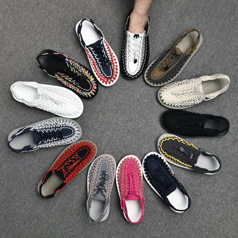 Various colorful sneakers arranged in a circular pattern on a gray surface.