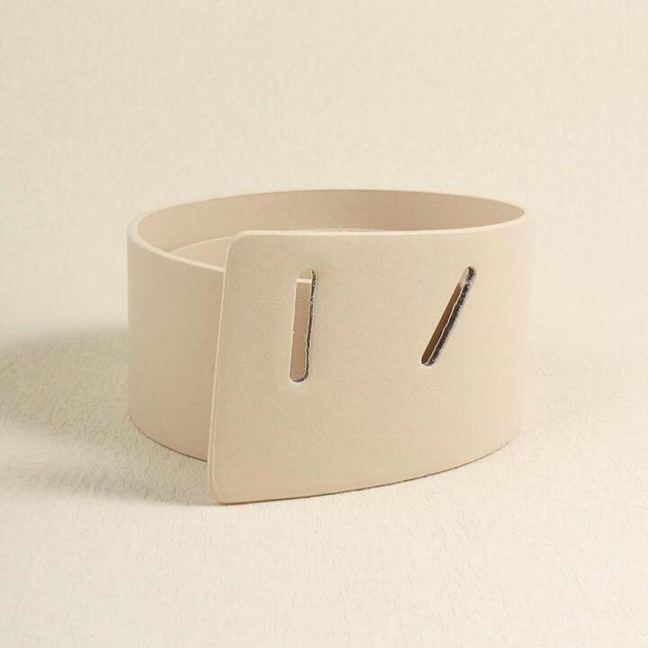 Beige belt with a square buckle on a beige background