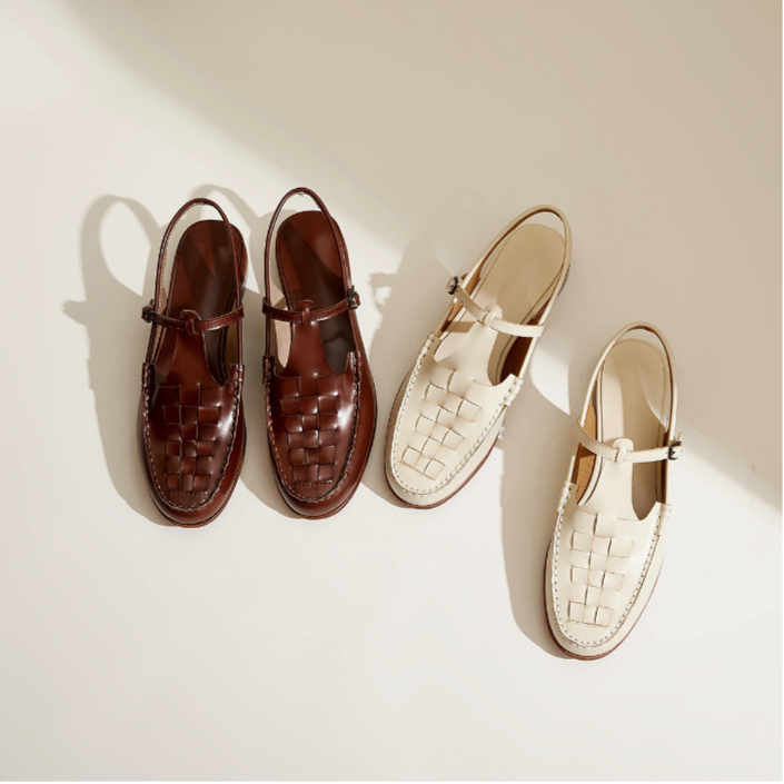 Pair of brown woven sandals and beige flat sandals on a light background