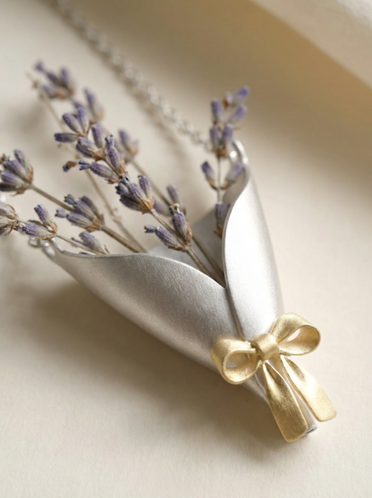 Bouquet of lavender tied with a gold ribbon on a beige background