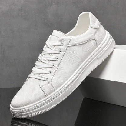White sneaker on a dark surface with a gray background