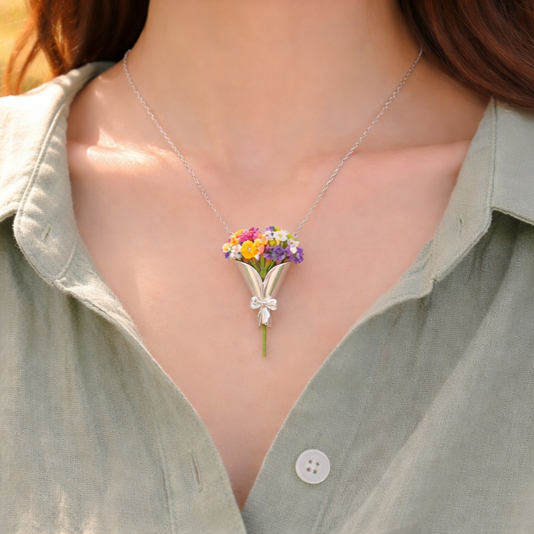 Necklace with a floral pendant worn by a person