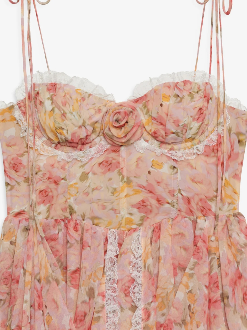 Floral dress with lace details on a white background