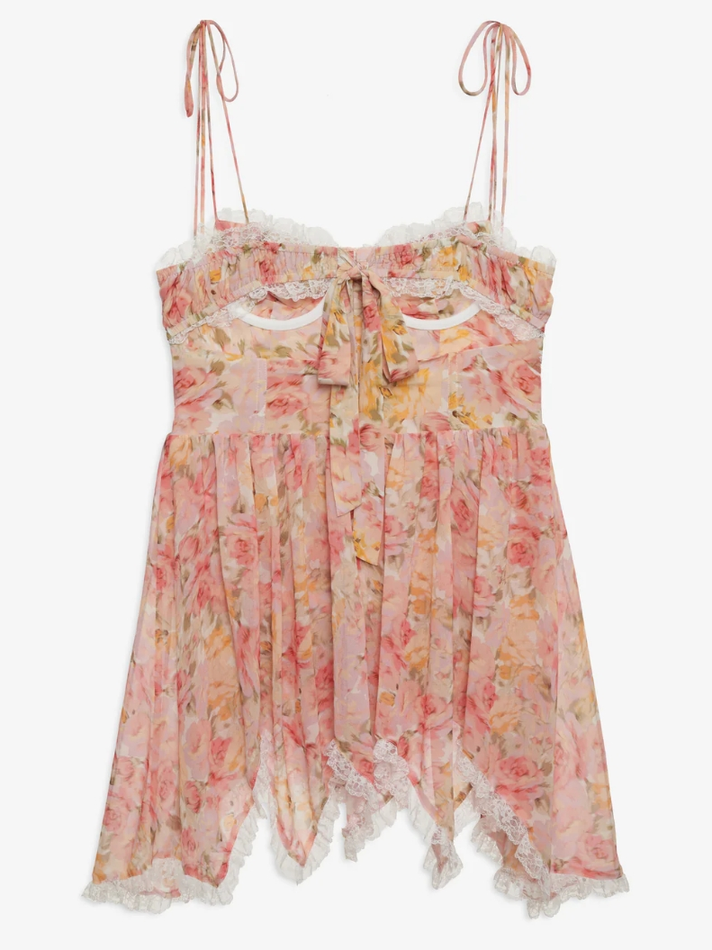Floral strapless top with lace details on a white background