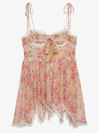 Floral strapless top with lace details on a white background