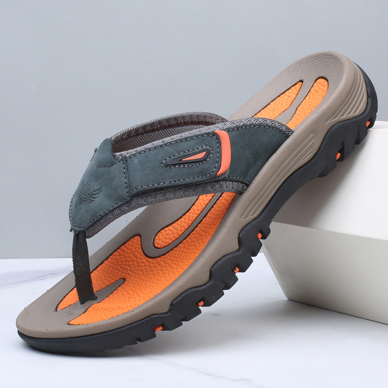 Gray and orange sandal on a light gray background