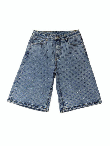 Blue denim shorts on a white background