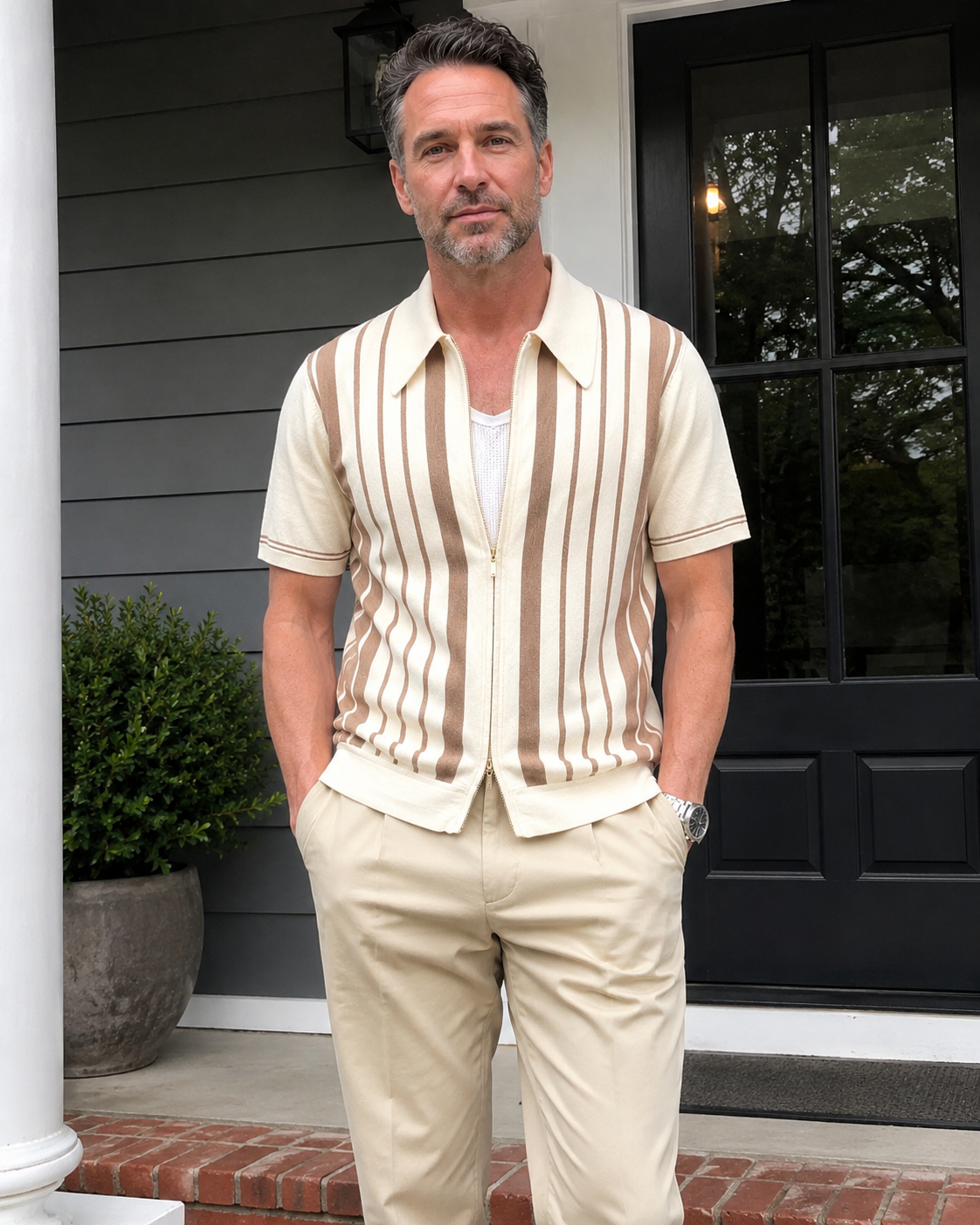 Front porch style photo of a man over 40 wearing the Riviera striped knit zip polo