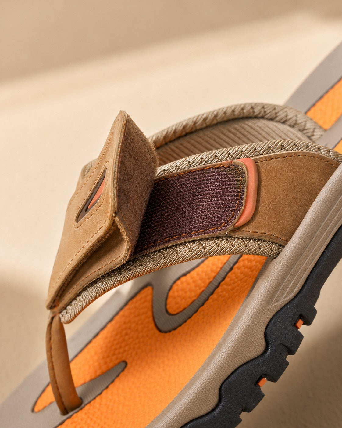 Close-up of the Sorrento sandal adjustable strap, stitching and padded textile trim