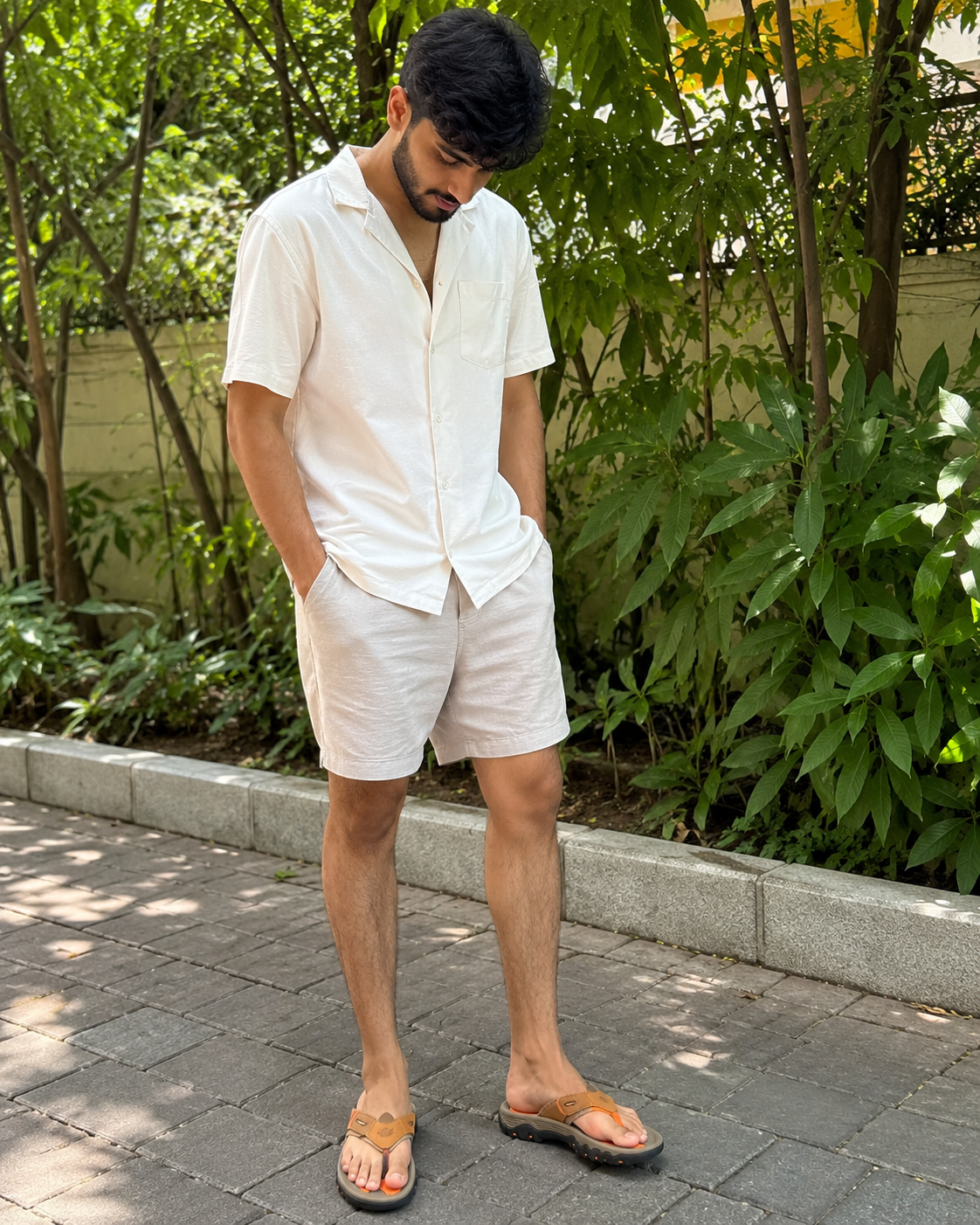 Garden path outfit reference wearing camel Sorrento Leather Sandals with cream summer clothes